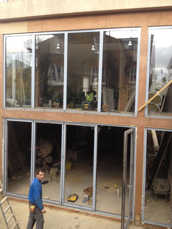 Aluminium bi-fold doors with two-storey glazing in Camberwell